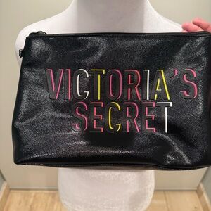 Victoria's Secret black and pink floral clutch bag